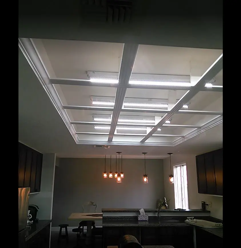 A room with lights and a ceiling fixture.