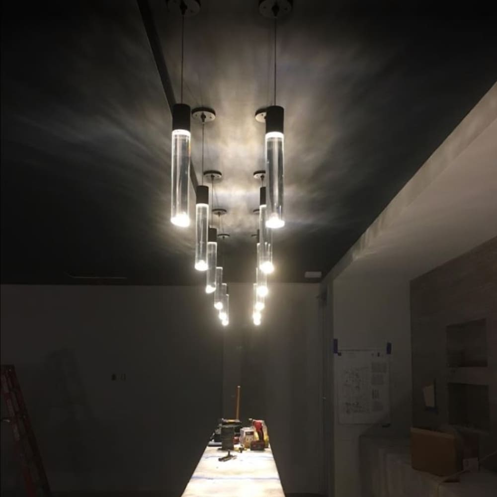 A group of lights hanging from the ceiling.