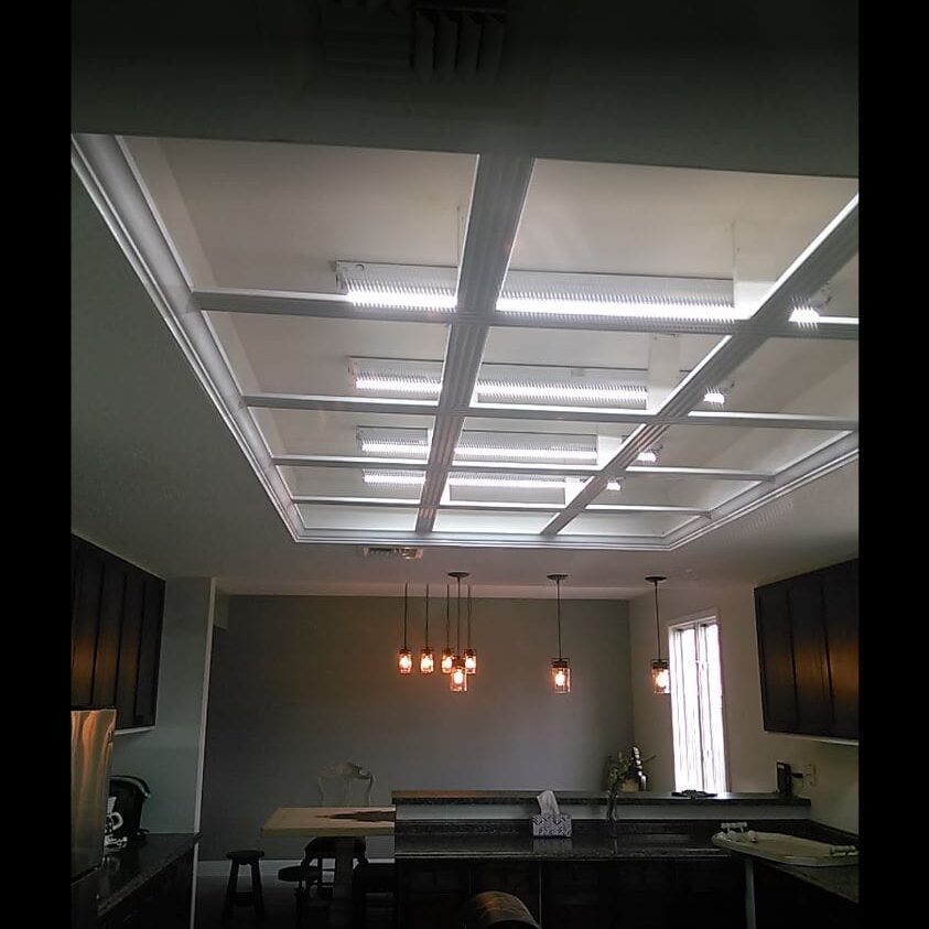 A room with lights and a ceiling fixture.